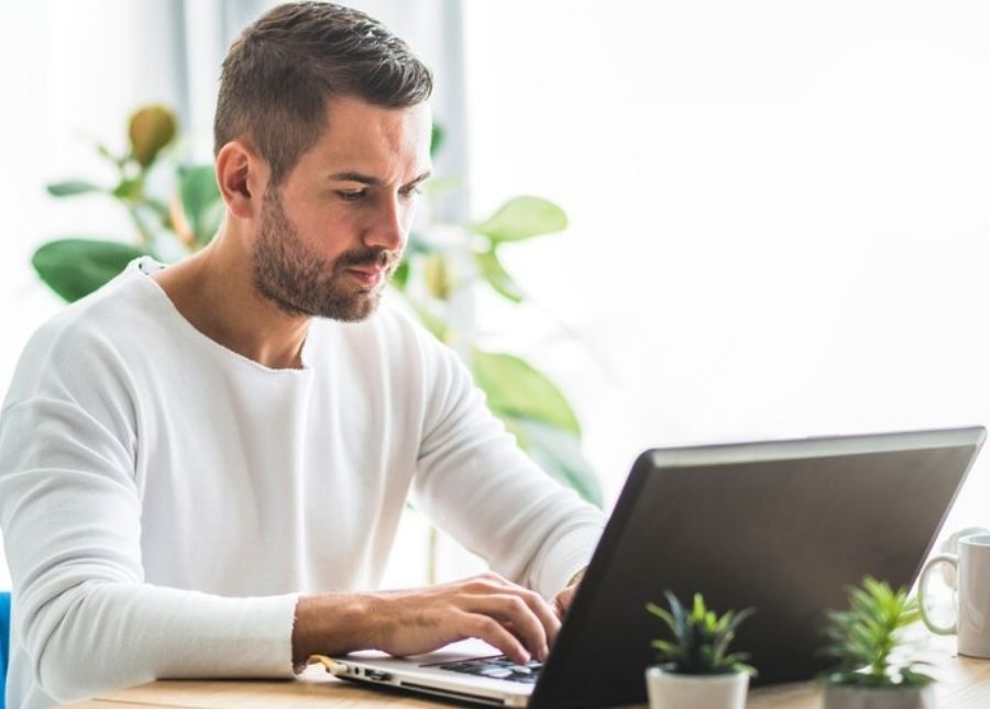 Man Technician Working On Laptop