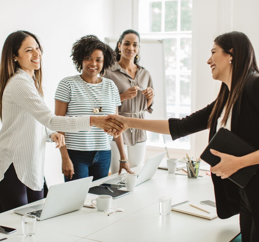 Women Handshaking After Property Management Interview