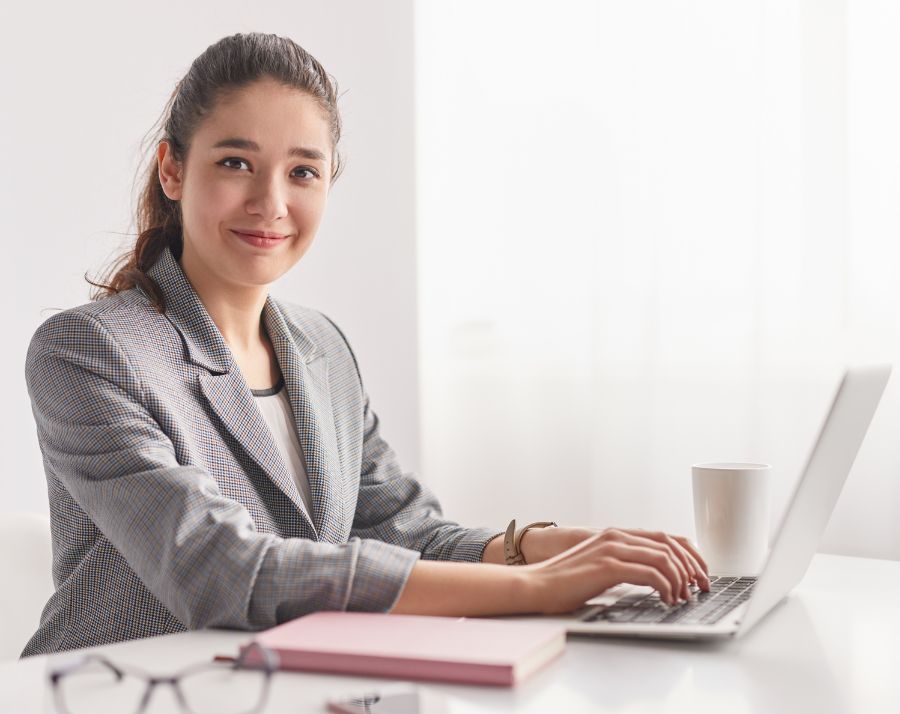 Woman Technician Working On Laptop